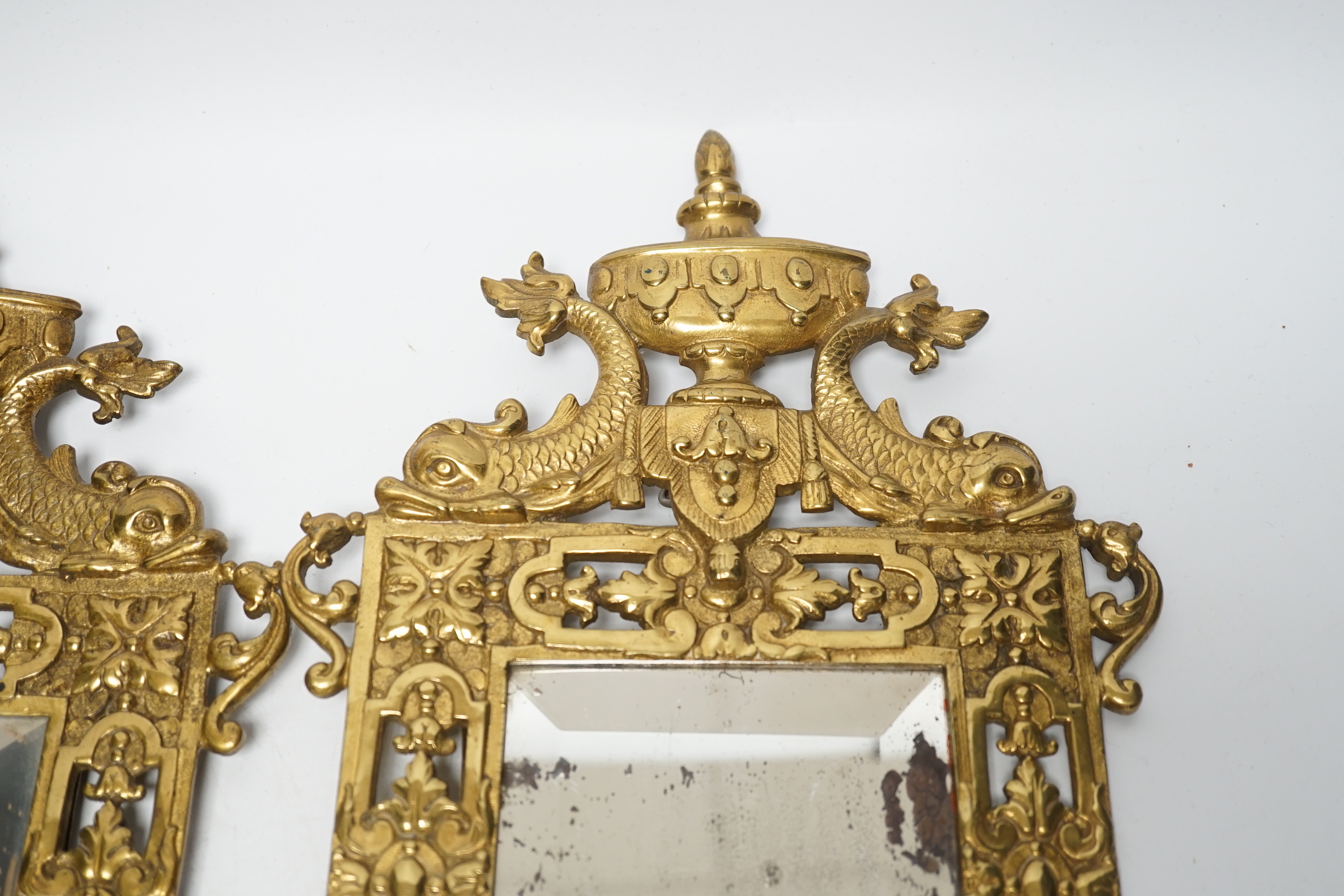 A pair of period-style mirrored brass girandoles, 61cm high